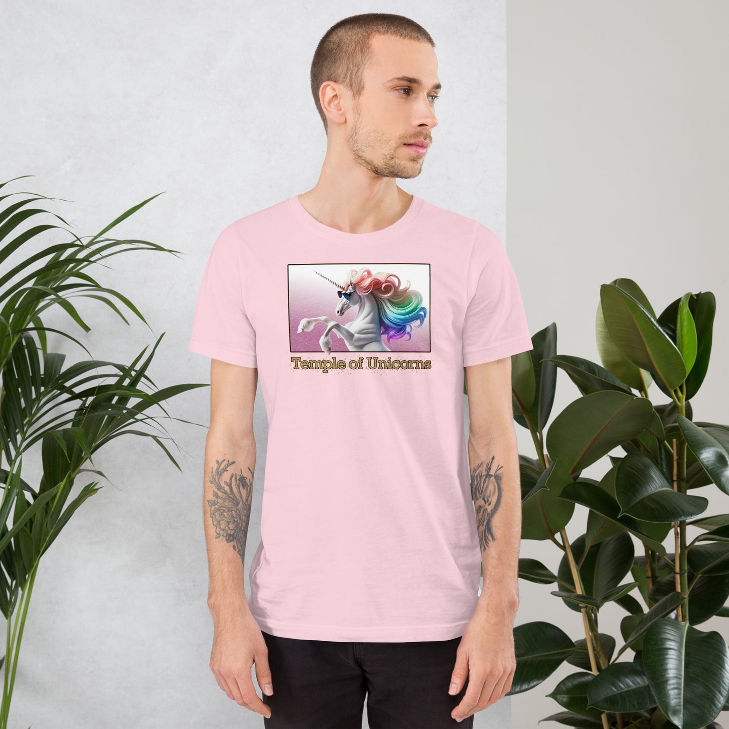 A man wearing Magic Unicorn Mens Tee, soft pink