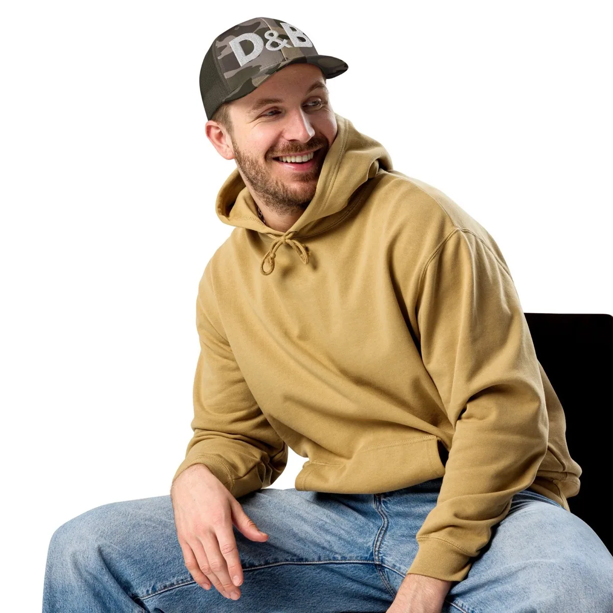 A man wearing D&B Camouflage Trucker Cap
