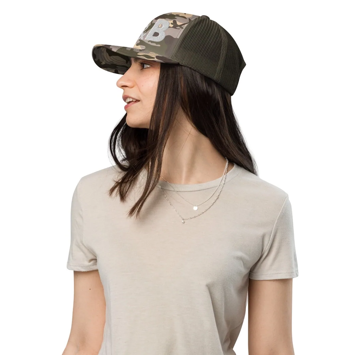 A woman wearing D&B Camouflage Trucker Cap
